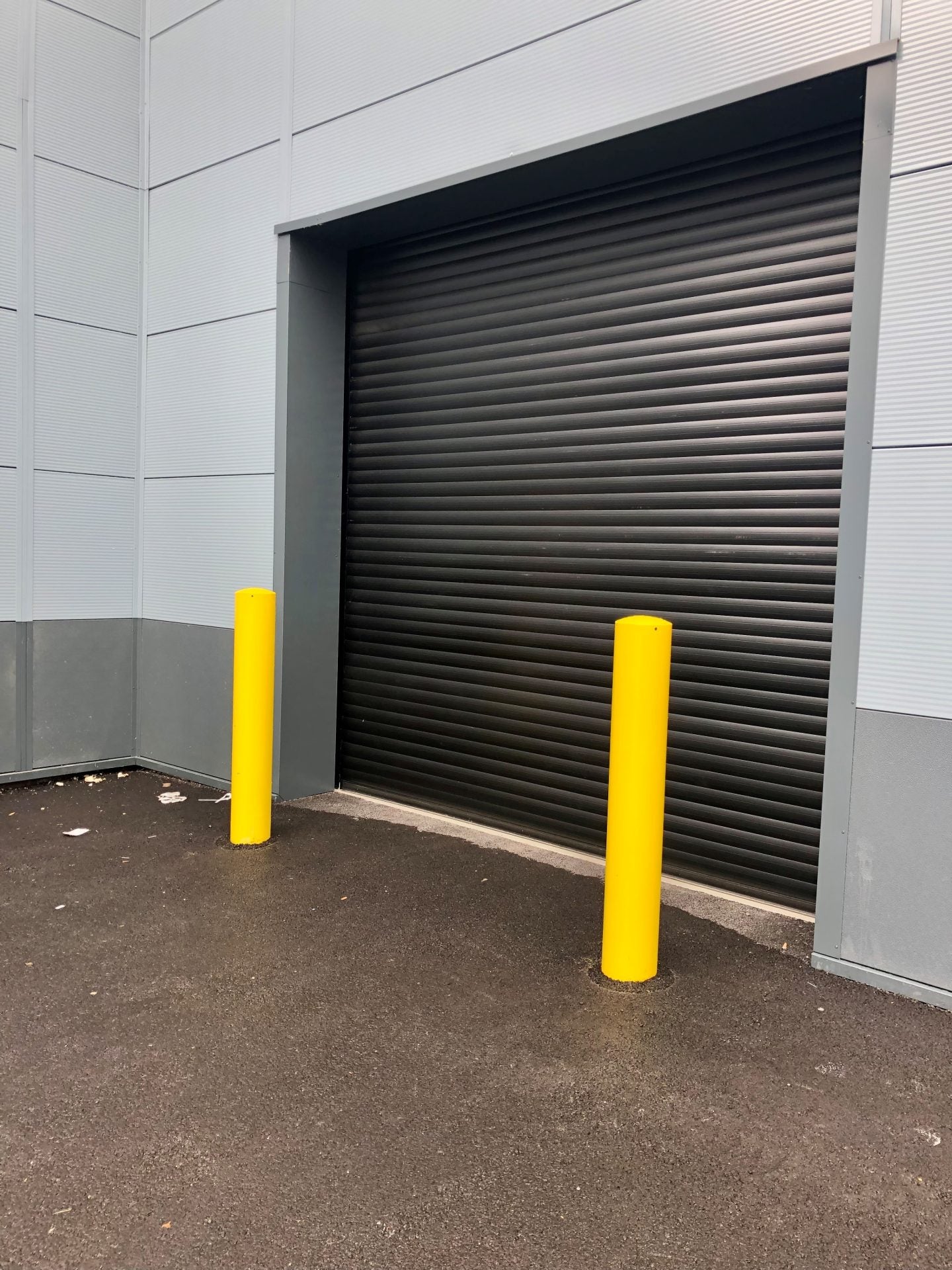 Yellow galvanised steel bollard