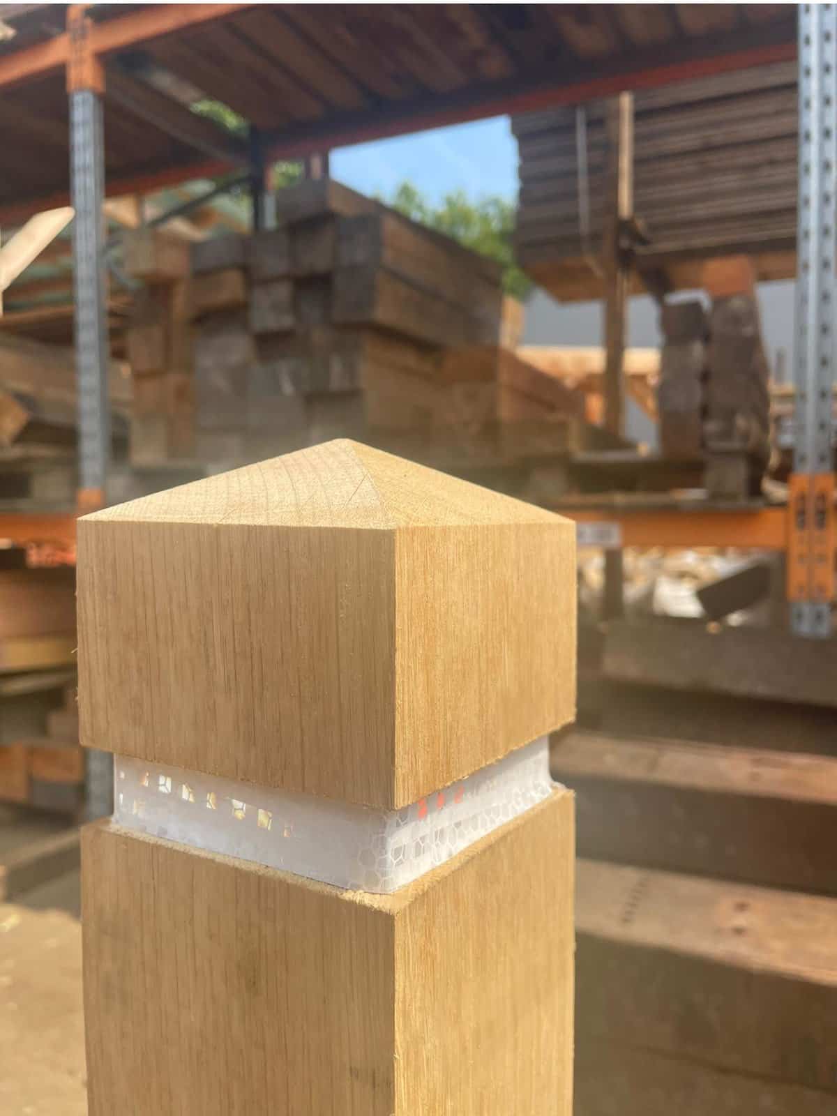 Timber bollard with reflective banding